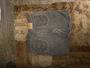 Vintage Levi's 550 Orange Tab Relaxed Fit Black Denim Cut Off Shorts Size 42